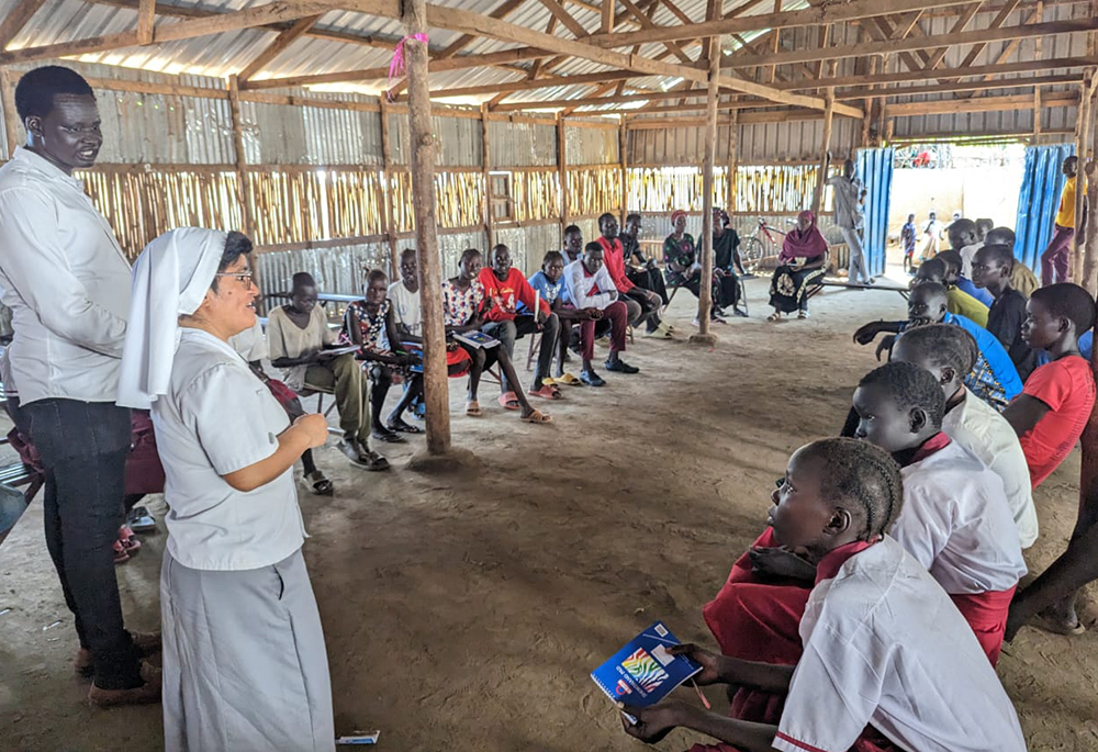 Ruth Karina Ubillus, a member of the Congregation of the School Sisters of Notre Dame, gives a workshop on trauma healing and reconciliation at a camp for internally displaced people in South Sudan. (Courtesy of Ruth Karina Ubillus)