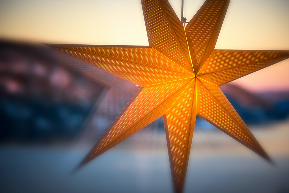 An orange seven-pointed star (Unsplash/Vidar Nordli Mathisen)