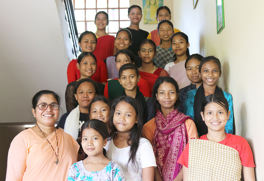 Sr. Rikta Gomes is pictured with St. Martha's High School students at Sreemangal, Moulvibazar District, in Bangladesh. (Stephan Uttom Rozario)