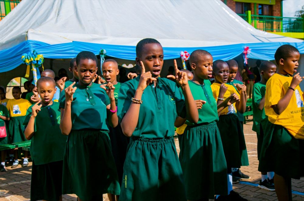 Students communicate using sign language