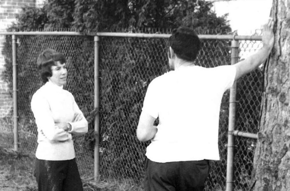 Adrian Dominican Sr. Beth Butler conferrs with an inmate at Southern Michigan State Penitentiary, Jackson, Michigan, in 1971. She educated inmates there for a decade/ (Courtesy of Beth Butler)