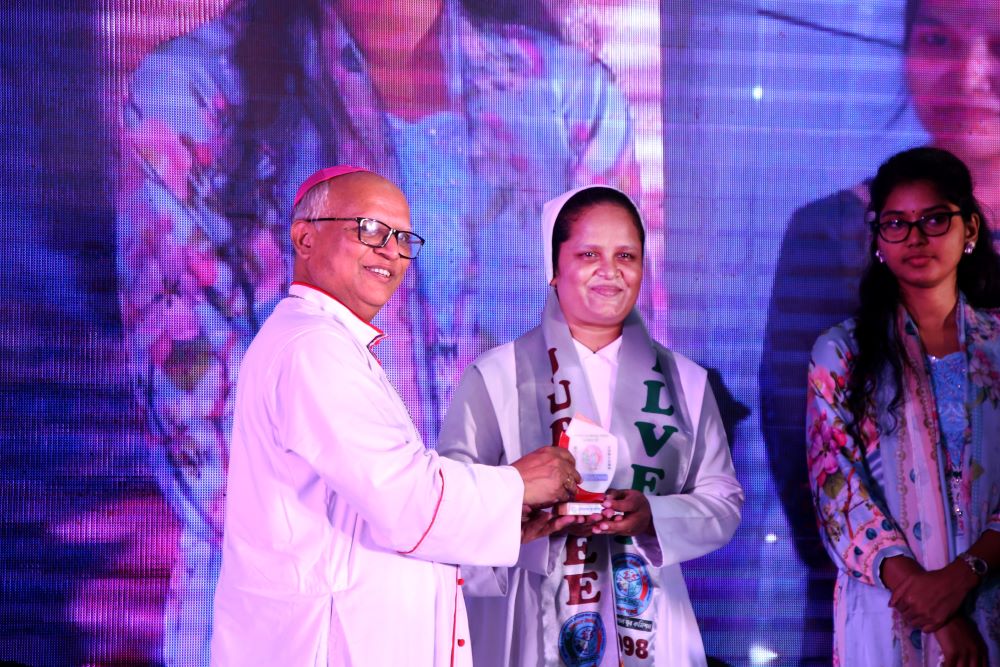Sr. Champa Adline Rozario was honored by the youth commission of the Catholic Bishops' Conference of Bangladesh on the silver jubilee of the commission. (GSR photo/Stephan Uttom Rozario)