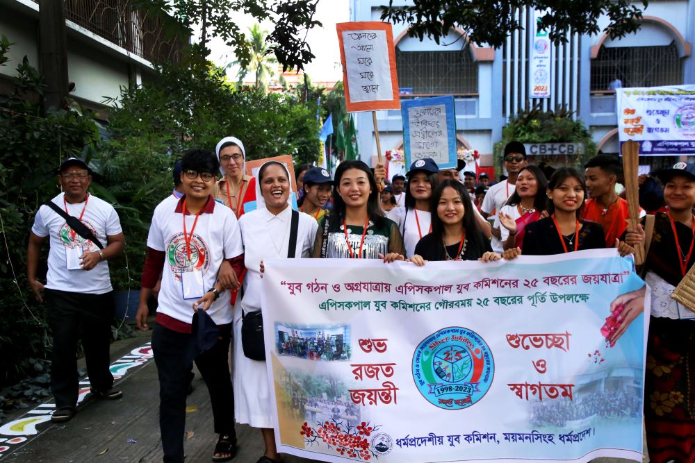 Our Lady of Sorrows Sr. Champa Adline Rozario joins young people in a peace rally.