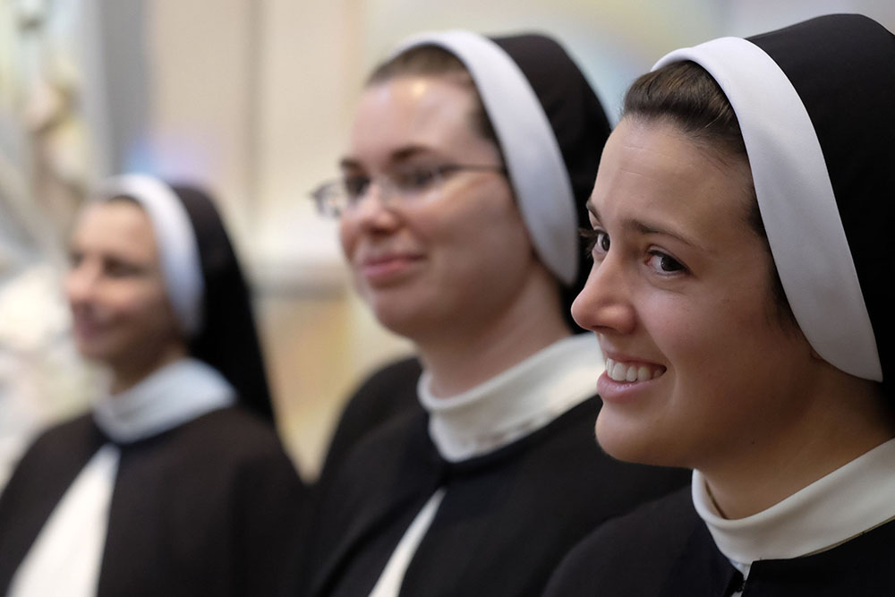 Members of the Dominican Sisters of St. Cecilia Congregation in Nashville, Tennessee, are pictured in a file photo preparing for Mass at the Cathedral of the Incarnation, where they made their final profession of religious vows. (OSV News/CNS file/Tennessee Register/Rick Musacchio)