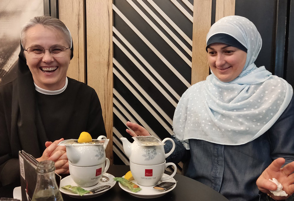 Sr. Iva Klarić, left, a Croatian teacher of religion and a member of the School Franciscan Sisters of Christ the King, Bosnian-Croatian Province, who has resided in Jajce for 15 years and Muslim elementary teacher Almina Sulejmanović, from the city of Fojnica, during a “peace gathering” of Catholic and Muslim students in Sarajevo,  the capital of Bosnia and Herzegovina. (Courtesy of Sr. Iva Klarić)