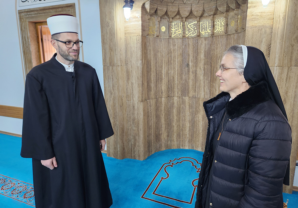 Ramiz Kahrić, the imam of the Esme Sultanija Mosque, left, and Sr. Iva Klarić, 51, a Croatian teacher of religion and a member of the School Franciscan Sisters of Christ the King, Bosnian-Croatian Province, who has resided in Jajce, Bosnia and Herzegovina, for 15 years. (GSR/Chris Herlinger)