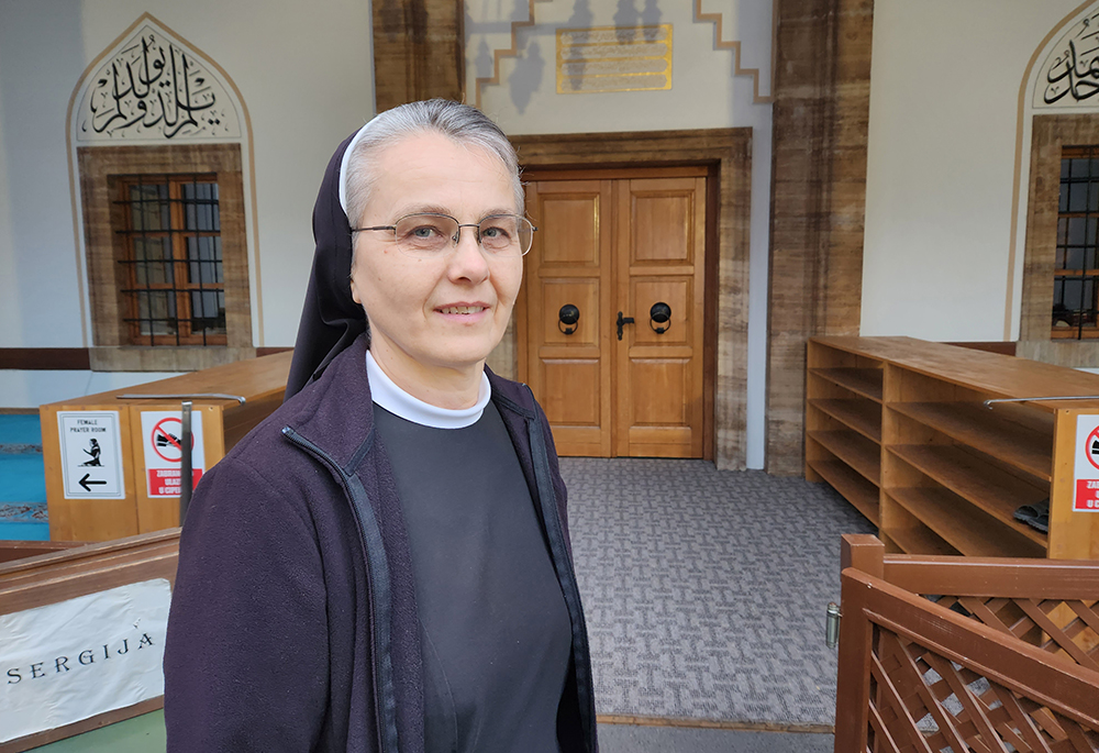 Sr. Iva Klarić, a Croatian teacher of religion and a member of the School Franciscan Sisters of Christ the King, Bosnian-Croatian Province, who has resided in Jajce for 15 years, is seen outside the Esme Sultanija Mosque. (GSR/Chris Herlinger)