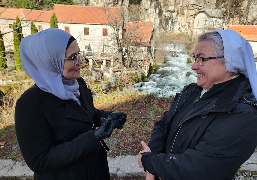 Sr. Blanka Jeličić, right, a Croatian-Slavonian music teacher and member of the Sisters of Mercy of St. Vincent de Paul, with her Muslim friend and colleague in interfaith cooperation, Šejla Mujić Kevrić, in the city of Livno, Bosnia and Herzegovina. (GSR/Chris Herlinger)