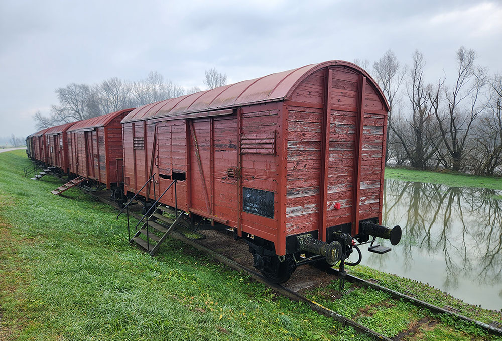 Remains of a train that brought prisoners to the Jasenovac concentration camp, which operated between 1941 and 1945. The train is now part of a display at a memorial site at Jasenovac, Croatia. (GSR photo/Chris Herlinger)