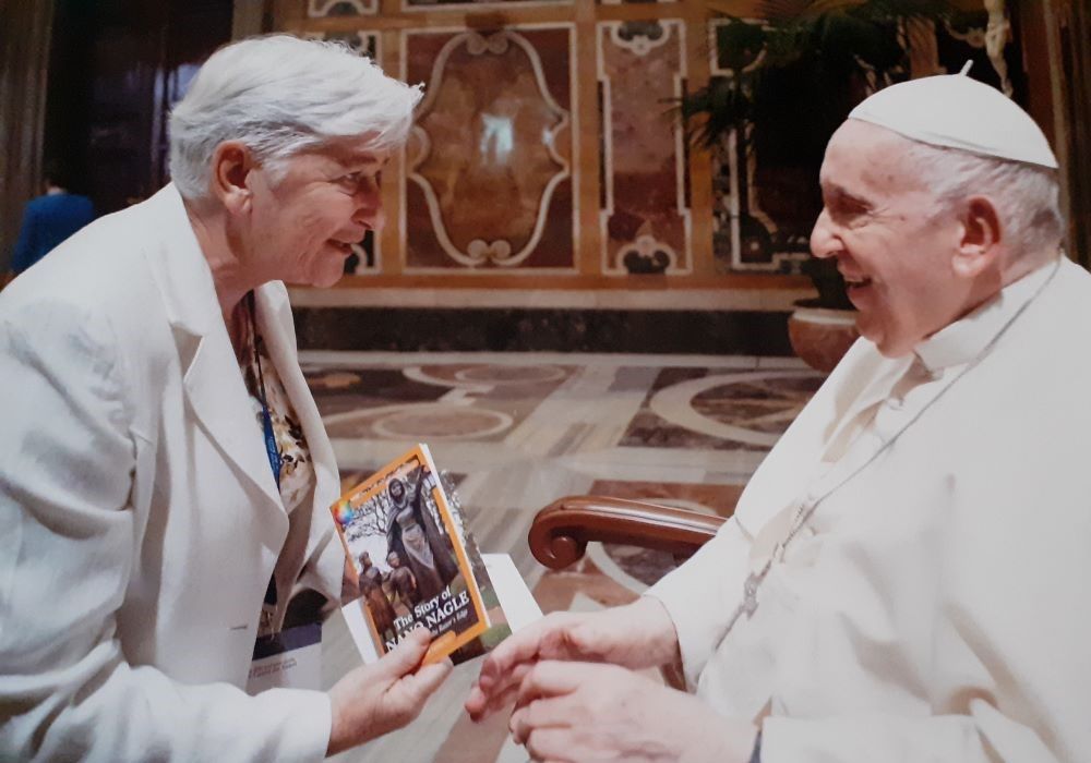 Sr. Anne Lyons presents her book, "The Story of Nano Nagle, A Life Lived on the Razor's Edge," to Pope Francis in October 2022.