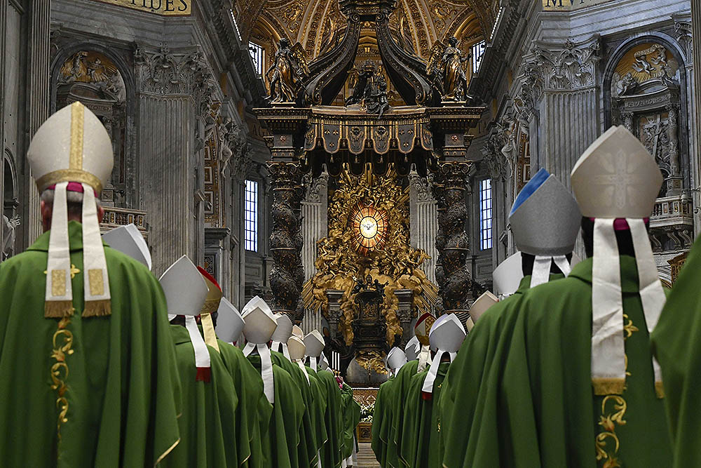 Bishops process into St. Peter's Basilica at the Vatican Oct. 29, 2023, for a Mass marking the conclusion of the first session of the Synod of Bishops on synodality. (CNS/Vatican Media)