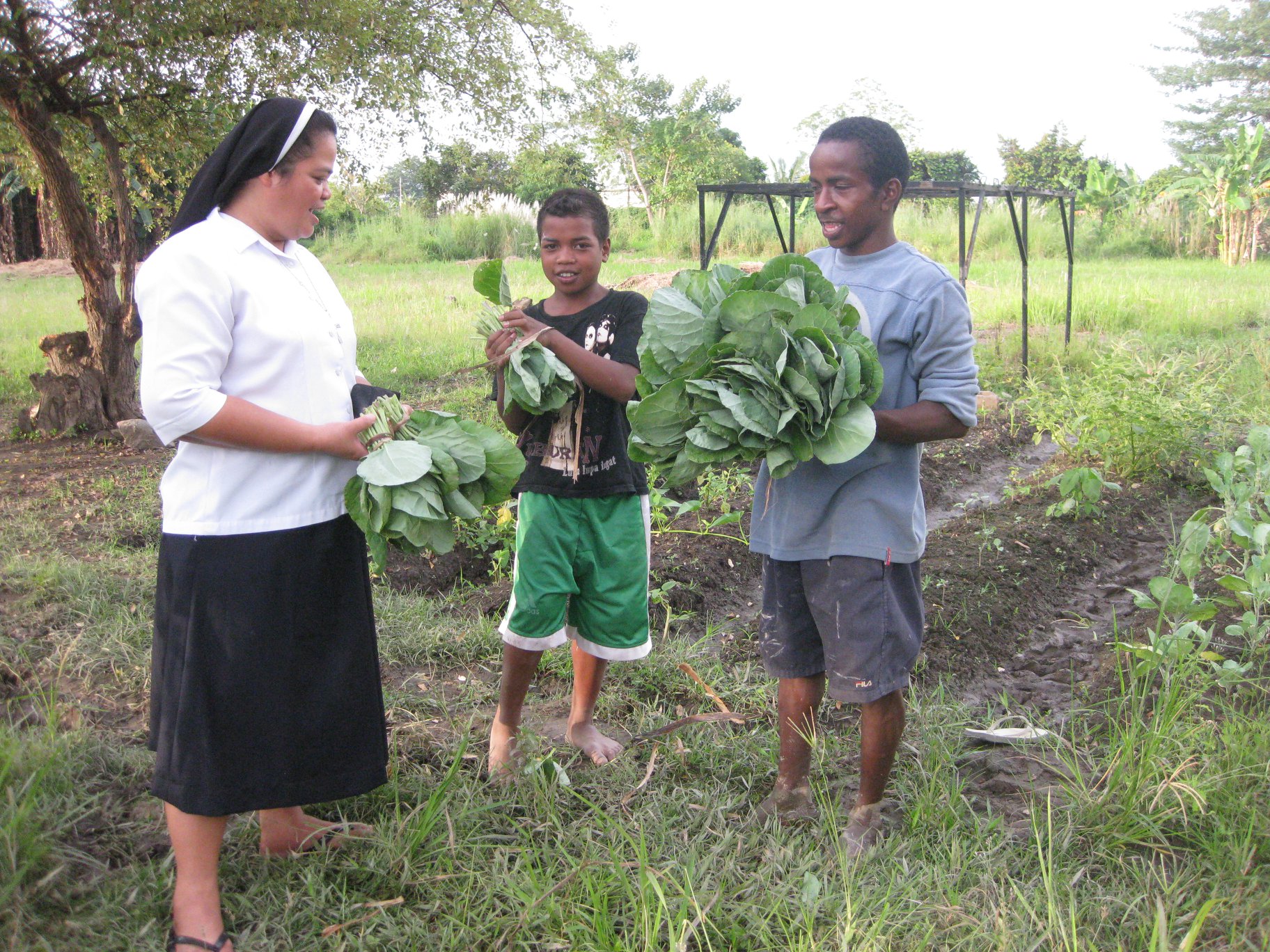 Sr. María Valentina Rebollos Paragas is pictured in the vegetable garden she and her fellow sisters established in 2006 to provide food for the children of the improvised orphanage in the mountains of Natarbora, near Bidau, East Timor. (Courtesy of Sr. María Valentina Rebollos Paragas)
