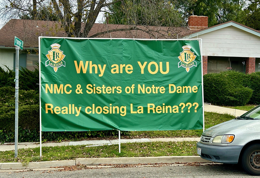 A signage addressing the announced closure of the all-girls Catholic school La Reina is pictured Feb. 3 in Thousand Oaks, California. A Jan. 24 announcement that the Sisters of Notre Dame plan to close the school by the end of June after nearly 60 years of operation has generated an impassioned pushback by students, parents and alumnae. (Tom Hoffarth)