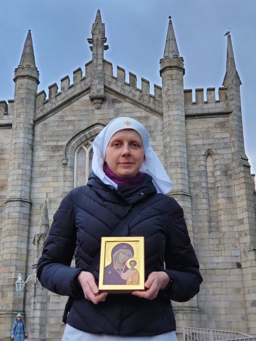 Sr. Helen holds icon Sister Helen Volynets poses with an icon of Mary and the Christ Child outside Holy Apostles Peter and Paul Russian Orthodox Church in Harold's Cross in Dublin March 3, 2024.