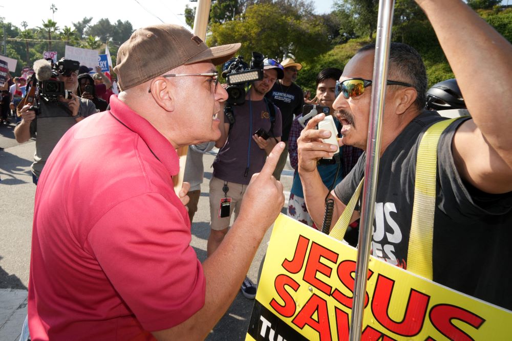 A confrontation takes place outside Dodger Stadium on June 16. Protesters gathered near the venue as the Los Angeles Dodgers prepared to honor the Sisters of Perpetual Indulgence a LGBTQ drag group that uses Catholic symbols in what some say is a mocking fashion.