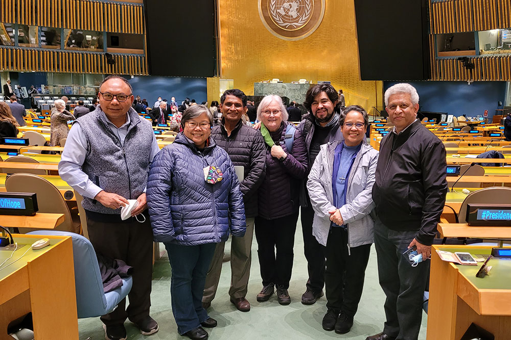 Dominican Sr. Dusty Farnan (center) stands with other nongovernmental organization representatives at the United Nations in New York in November 2021. (Courtesy of Dusty Farnan)