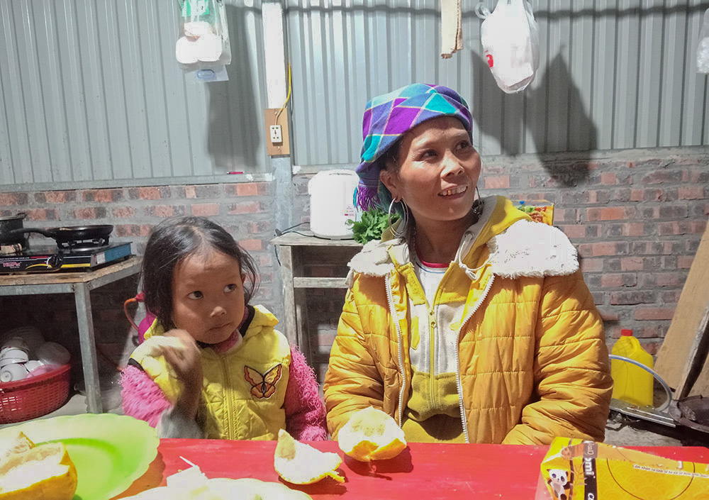 Therese Giang Thi Dy prepares food for children at San I Subparish in Sa Pa town of the northern province of Lao Cai, Vietnam, on Dec. 9, 2023. (Joachim Pham)