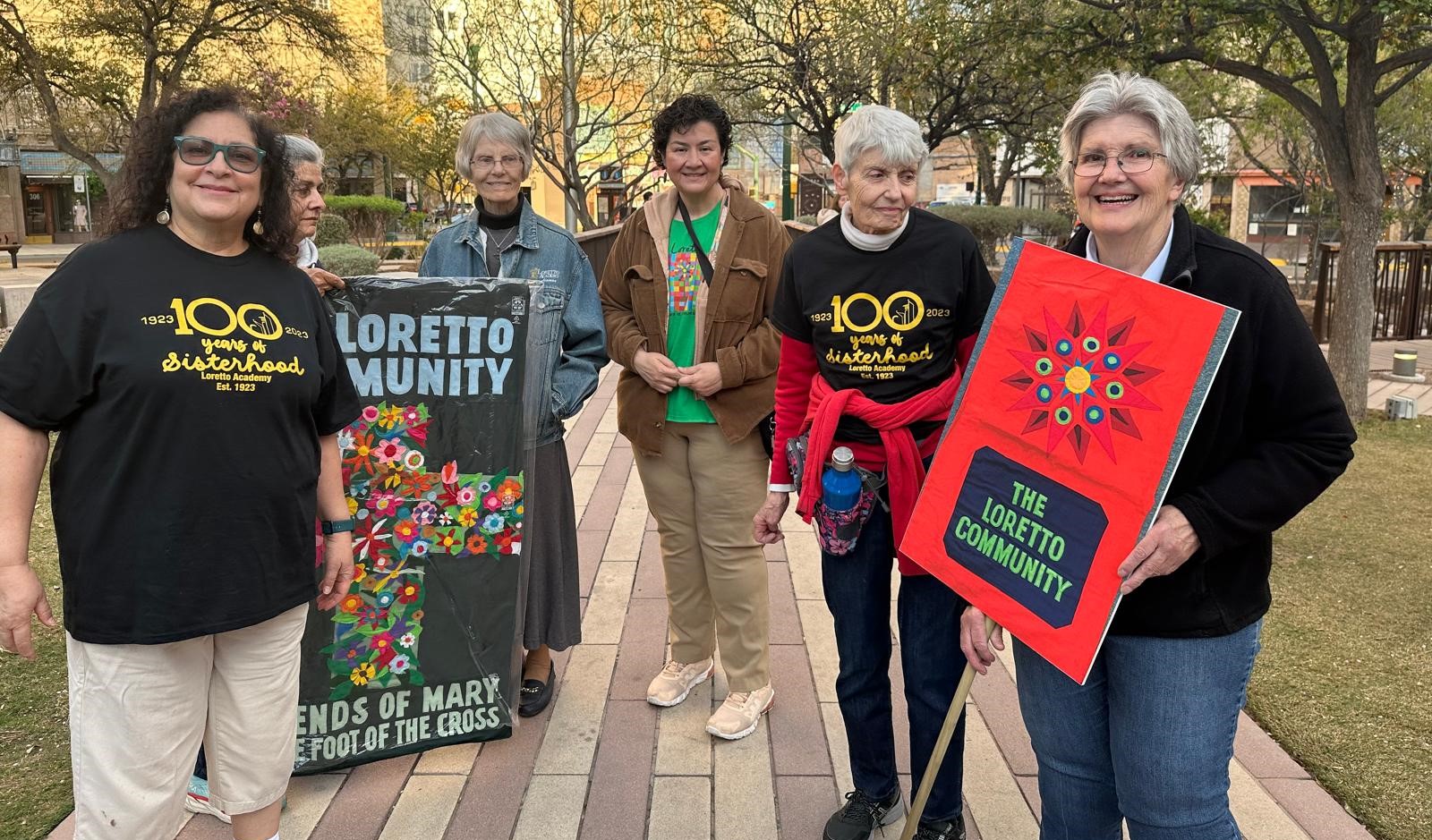 Sisters of Loretto arrive at a March 21 march to defend the dignity of migrants.