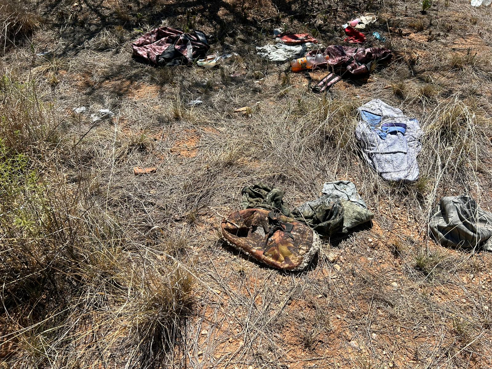 In the Arizona desert the life stories of migrants linger in the form of shoes, clothes, photographs, crosses, backpacks and other objects they leave behind before continuing their journey. (Peter Tran) 