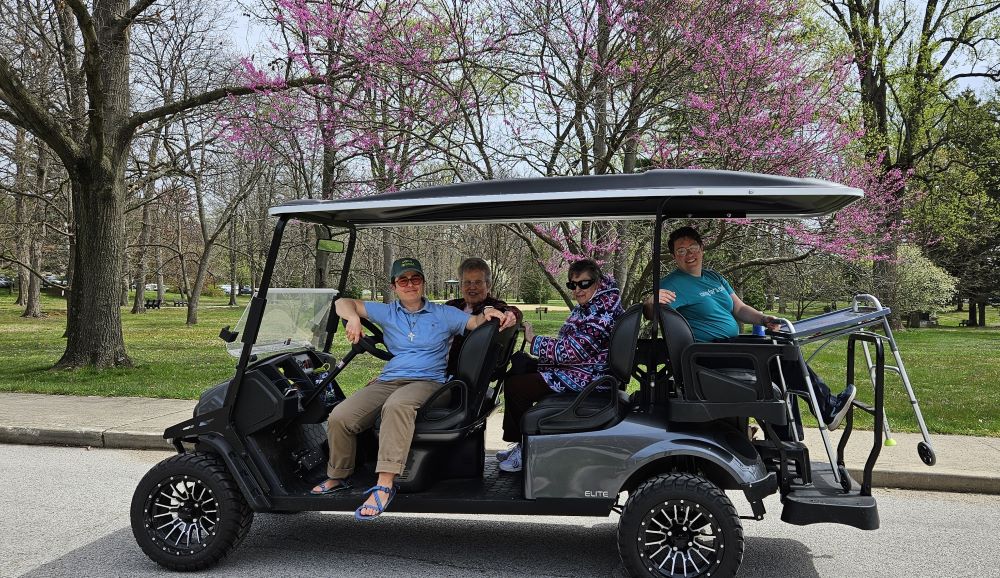 Sr. Emily TeKolste transports sisters to an eclipse-watching party at the campus of the Sisters of Providence of St.-Mary-of-the-Woods, Indiana, on April 8.