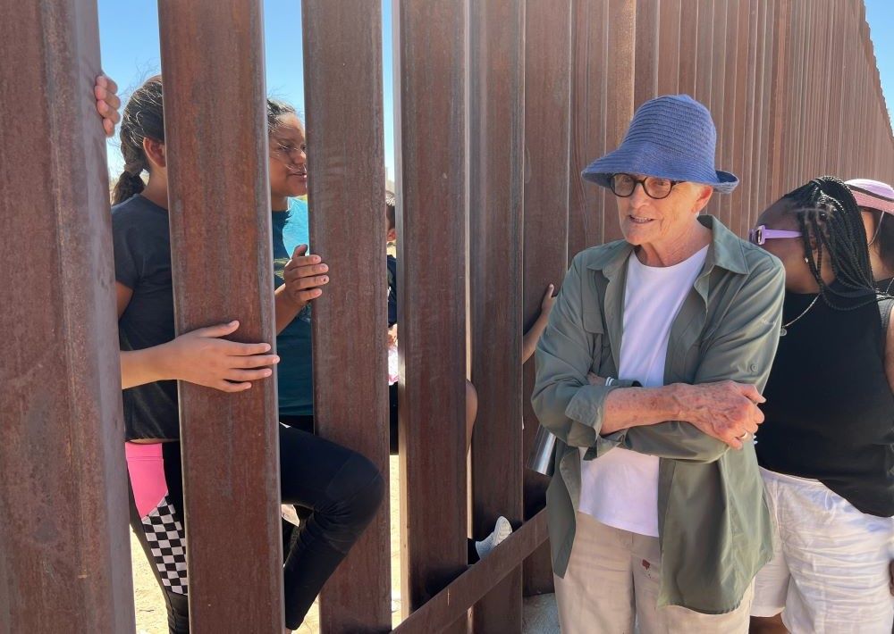 Mercy Sr. Kathleen Erickson is seen at the wall on the U.S. southern border in 2022. 