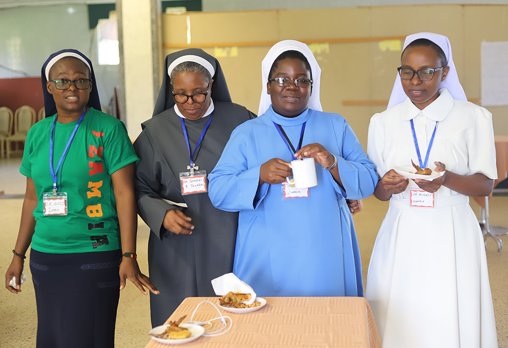 Religious sisters interact during a break at the AAC: SS convening at the Imperial Botanical Beach Hotel in Entebbe, April 9. (Doreen Ajiambo)