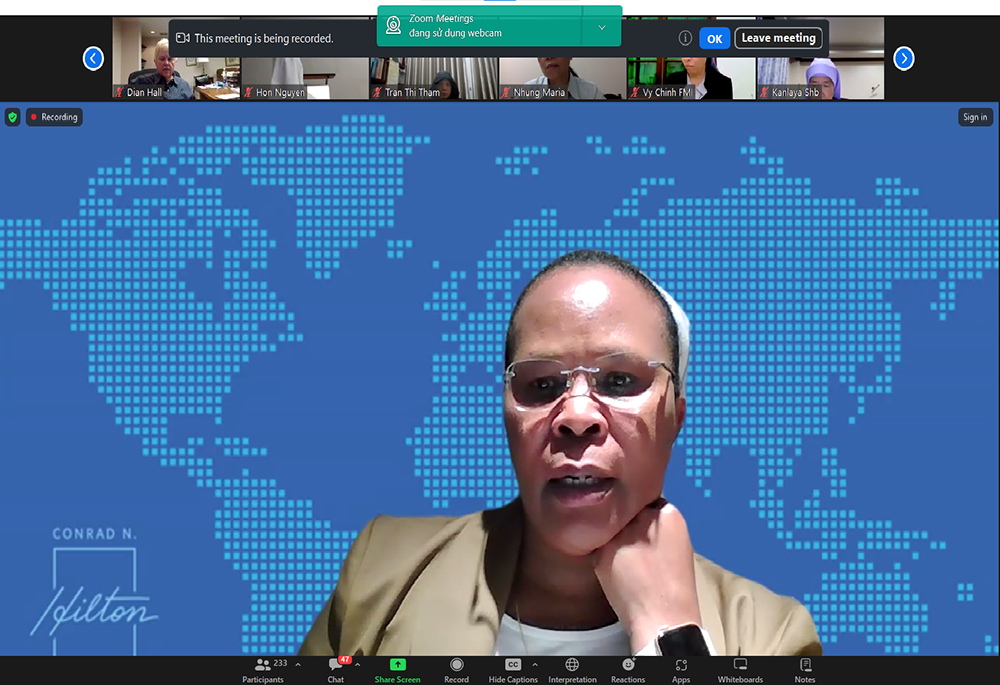 Little Sisters of St. Francis Sr. Jane Wakahiu, who serves as the associate vice president, program operations and head of Catholic Sisters at the Conrad N. Hilton Foundation, speaks in a webinar on the status of religious life in Vietnam. (Screenshot/Joachim Pham)