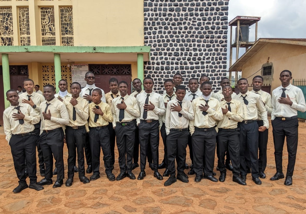 Students of St. Paul's English Catholic College Dschang are pictured outside their school compound in Dschang, a town in the northwestern region of Cameroon. Sr. Janefrancis Kinyuy is vice principal of the school, which provides primary and secondary education to children orphaned and displaced as a result of the ongoing civil war.