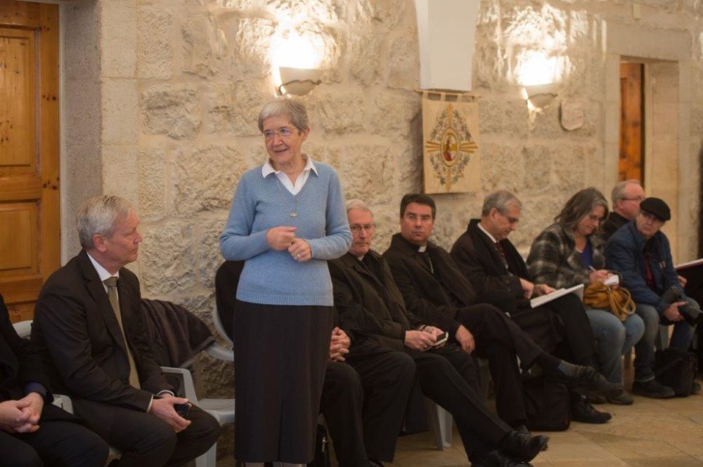 Sr. Hildegard Enzenhofer speaks with a group of visiting bishops. Sr. Hildegard Enzenhofer speaks with a group of visiting bishops.