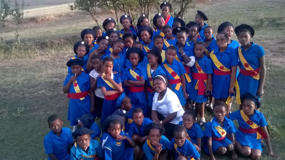 Sr. Agnes Motake is seen with children in the group Soldiers of Christ the King. Sr. Agnes Motake is seen with children in the group Soldiers of Christ the King.