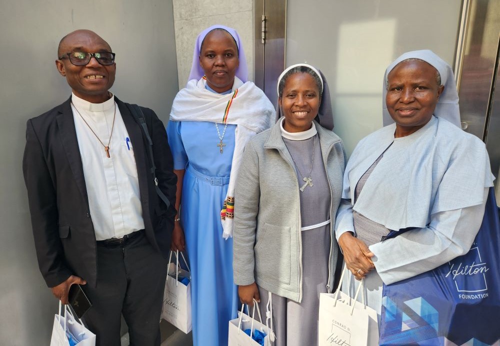 Summit of the Future participants included, from left, Jesuit Fr. Charles Chilufya, representing the Bakhita Partnership for Education; and Srs. Hedwig Muse, Nelly Chisense and Jane Frances Kabagaaju. (Chris Herlinger) Summit of the Future participants included, from left, Jesuit Fr. Charles Chilufya, representing the Bakhita Partnership for Education; and Srs. Hedwig Muse, Nelly Chisense and Jane Frances Kabagaaju. (Chris Herlinger)