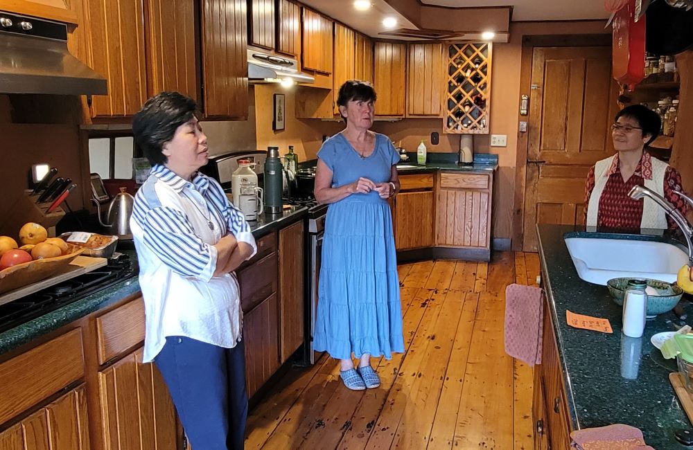 Members of the Sisters of the Earth Community gather in the kitchen at Green Mountain Monastery. Members of the Sisters of the Earth Community gather in the kitchen at Green Mountain Monastery.