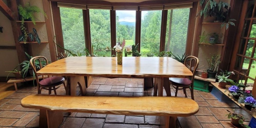 The dining table overlooks the grounds of the Green Mountain Monastery. The dining table overlooks the grounds of the Green Mountain Monastery.