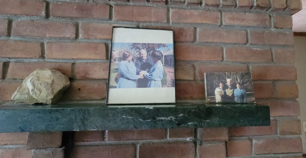 Early photos of Green Mountain Monastery cofounders Srs. Gail Worcelo and Bernadette Bostwick, and Fr. Thomas Berry adorn a fireplace mantel at the monastery. (GSR photo/Gail DeGeorge) Early photos of Green Mountain Monastery cofounders Srs. Gail Worcelo and Bernadette Bostwick, and Fr. Thomas Berry adorn a fireplace mantel at the monastery. (GSR photo/Gail DeGeorge)