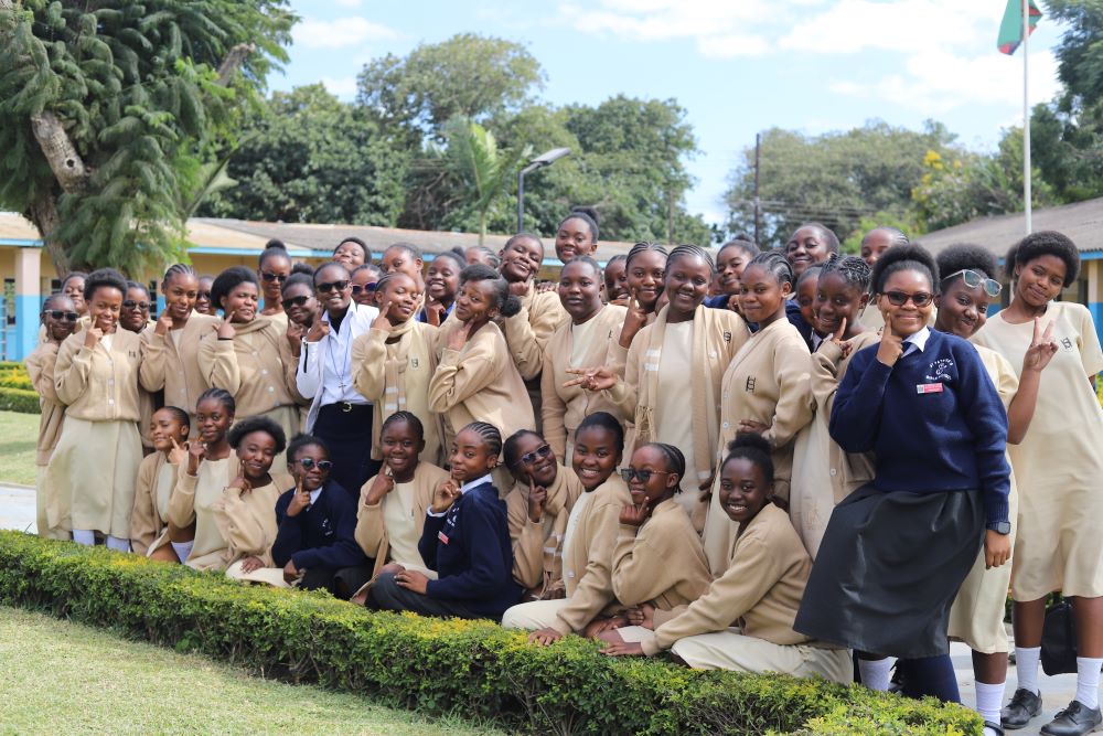 Sr. Angela Ngwenyufu, a member of the Handmaid Sisters of the Blessed Virgin Mary, poses for a photo with her students at St. Patrick's Secondary Girls School in Lusaka, Zambia, on May 25. (GSR photo/Doreen Ajiambo) Sr. Angela Ngwenyufu, a member of the Handmaid Sisters of the Blessed Virgin Mary, poses for a photo with her students at St. Patrick's Secondary Girls School in Lusaka, Zambia, on May 25. (GSR photo/Doreen Ajiambo)