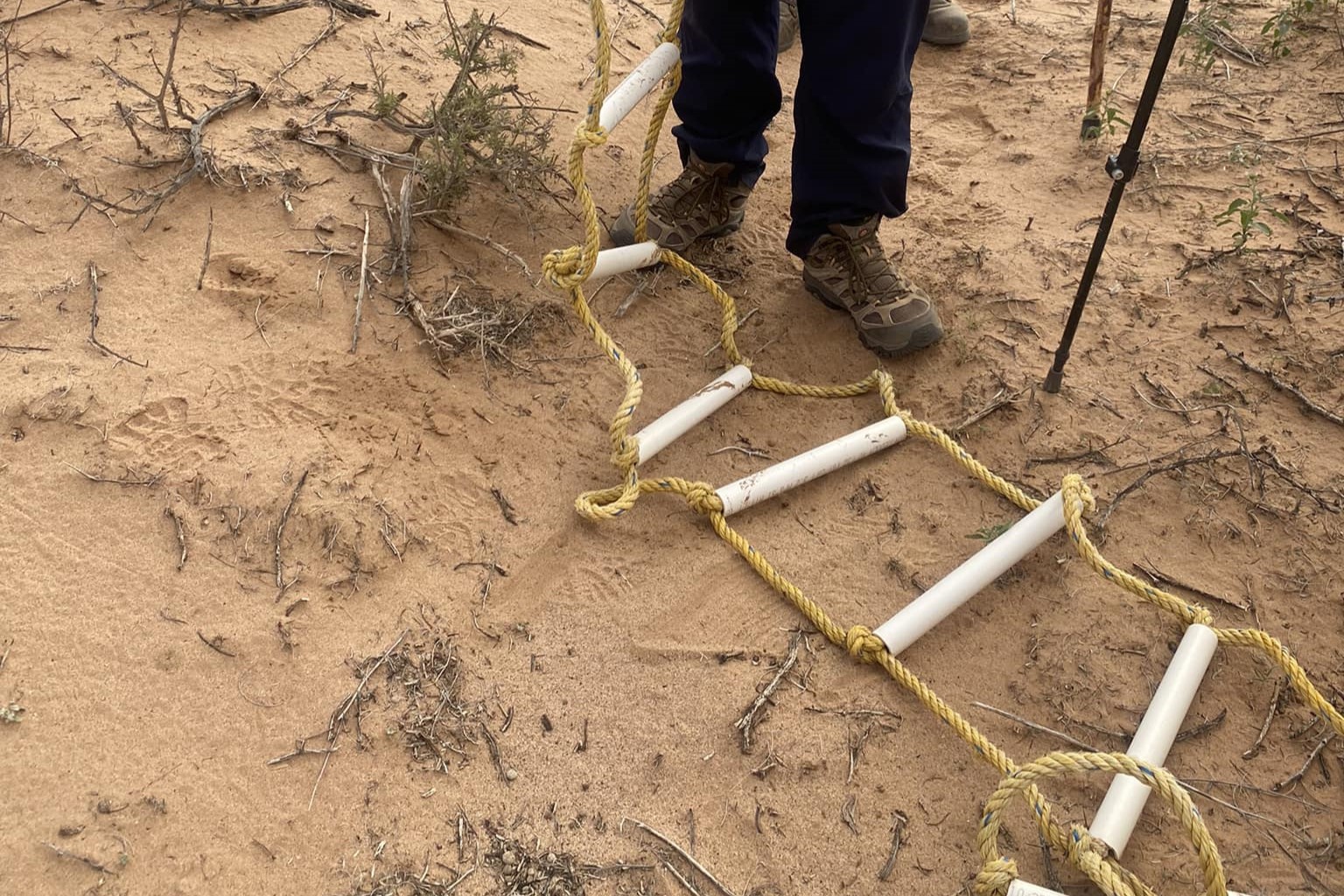 Dangerous makeshift ladders built by migrants are used to climb over the wall on the border between Mexico and the United States. (Courtesy of Leticia Gutiérrez Valderrama)