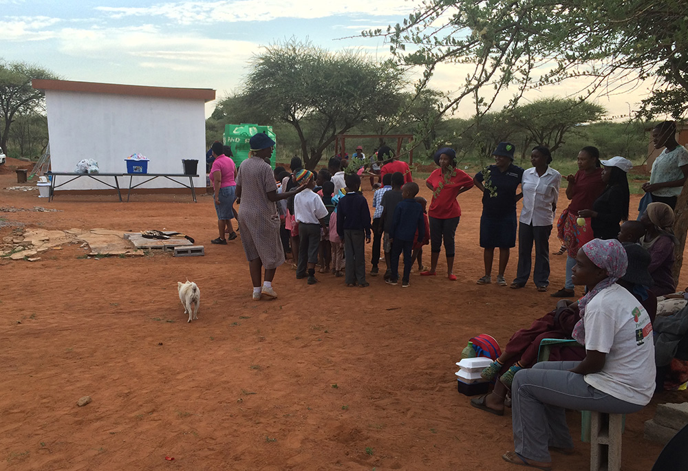 The children's choir, joined by volunteers and sisters, performs an outstanding rendition of traditional Christmas songs during the "Keresemose kwa Masimong" ("Christmas in the Fields") celebration. (Courtesy of Pulane Makepe)