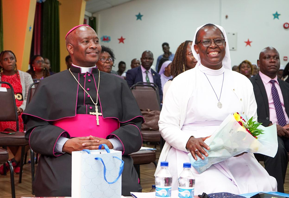 Bishop Wallace Ng'ang'a Gachihi of the Military Ordinariate of Kenya and Sr. Agnes Lucy Lando are pictured at the launch of Lando's new book on Oct. 30 at Paulines Communication Centre in Nairobi, Kenya. (Courtesy of Association for Catholic Information in Africa and FIAT Communications and Consultancy Centre, Nairobi)