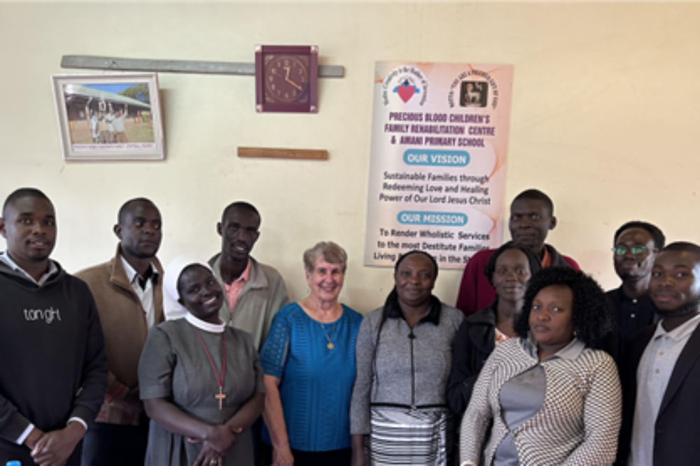 Sr. Caroljean Willie and Amani faculty Sr. Caroljean Willie and Amani faculty