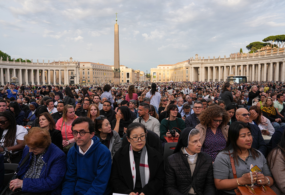Thousands of people gather in St. Peter's Square at the Vatican to pray the rosary for the repose of the soul of Pope Francis April 21, 2025, the evening of his death. (CNS/Lola Gomez)