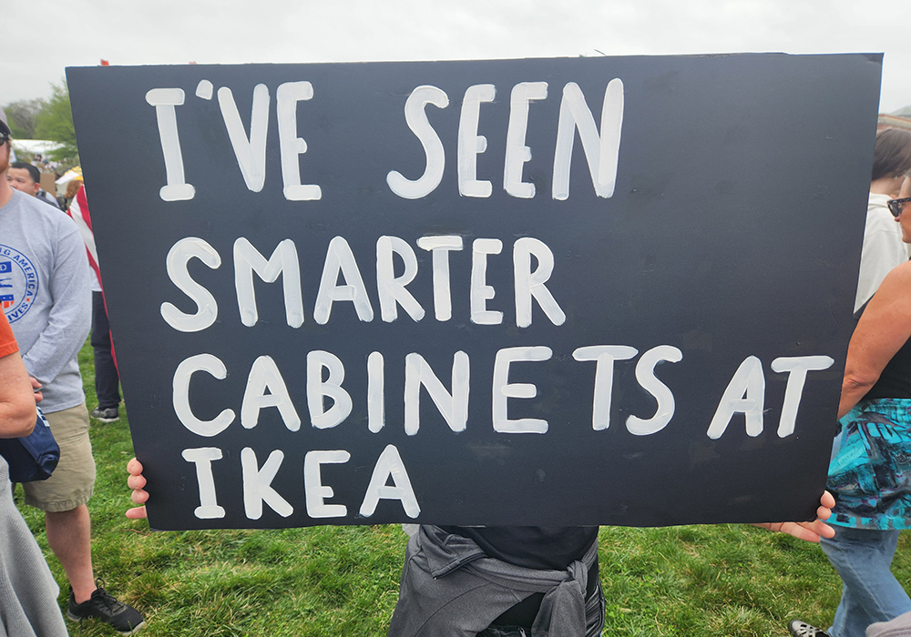 A sign criticizing President Donald Trump's Cabinet during the April 5 "Hands Off!  demonstration in Washington, D.C. (GSR photo/Chris Herlinger)
