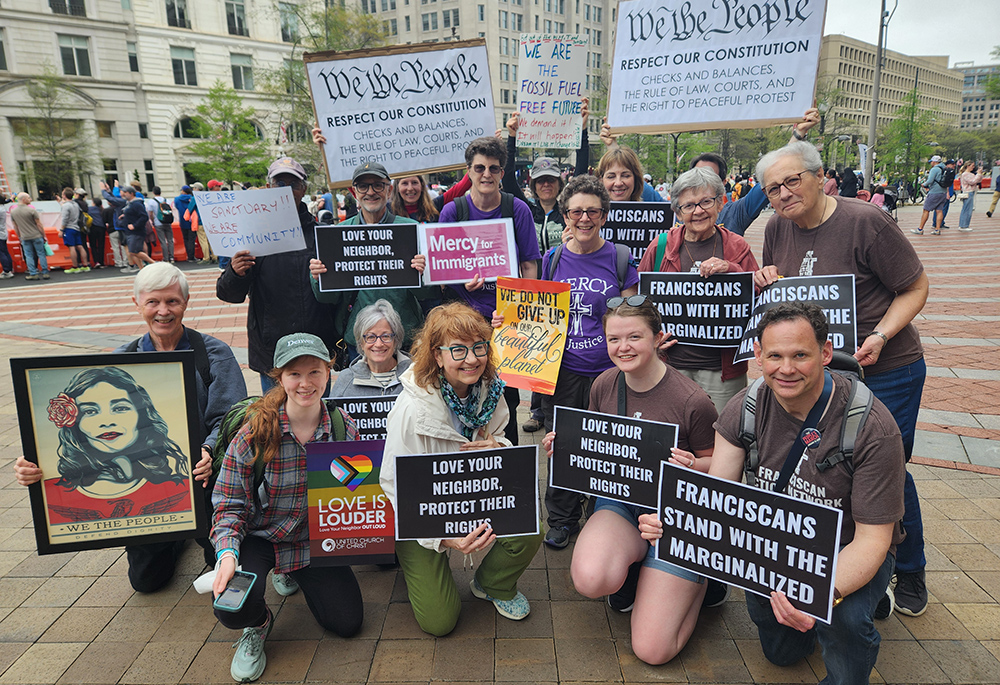 A group of more than a dozen faith-based activists — sisters of different congregations, lay associates, supporters — who participated in the April 5 "Hands Off!" demonstration in Washington D.C. were among those attending the nationwide rally. (GSR photo/Chris Herlinger)