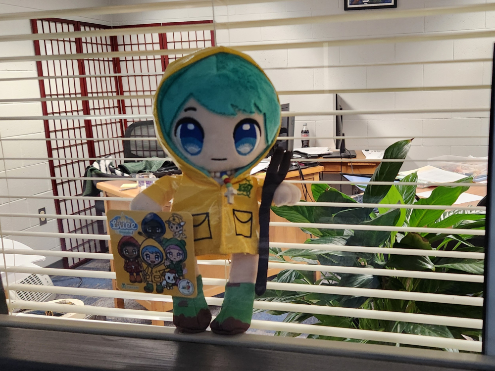 Luce plush Luce, the 2025 Jubilee Year of Hope's mascot, adorns the office window of author Jane Marie Bradish.