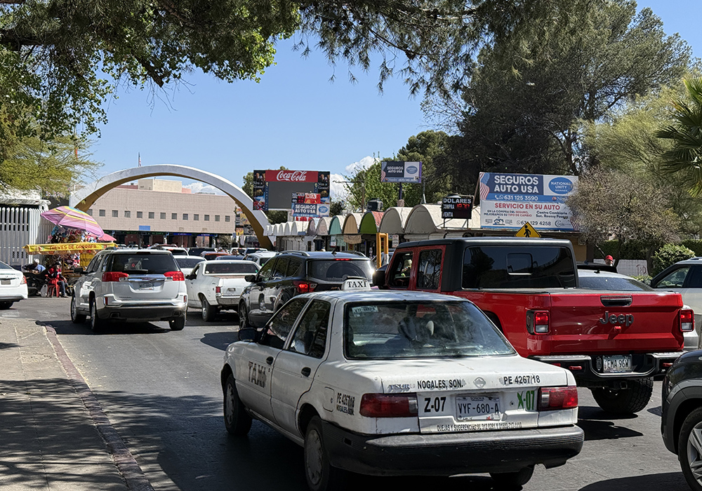 Northbound traffic heading toward the U.S. border crossing from Nogales, Mexico, on April 5, next to the starting point of a Via Crucis procession honoring migrants. (Anita Snow)