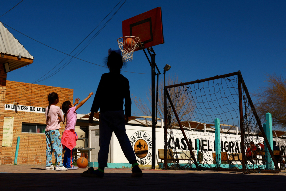 Migrant girls playing Migrant girls play at the Casa del Migrante shelter in Ciudad Juarez, Mexico, Feb. 22, 2025. (OSV News/Reuters/Jose Luis Gonzalez)