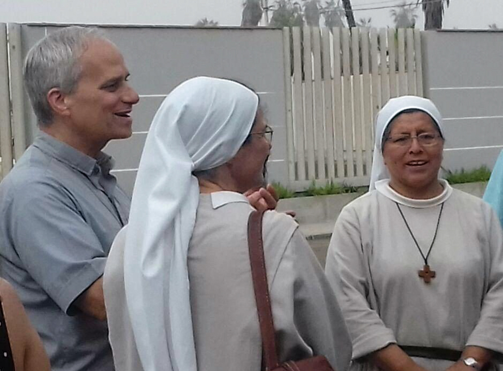 The future Pope Leo XIV visits with Augustinian sisters in Peru in this undated photo. As an Augustinian priest, then-Father Robert F. Prevost spent many years as a missionary in Peru and also served as bishop of that country's Chiclayo Diocese. (OSV News/Courtesy of Augustinian Sr. Carmen Toledano)