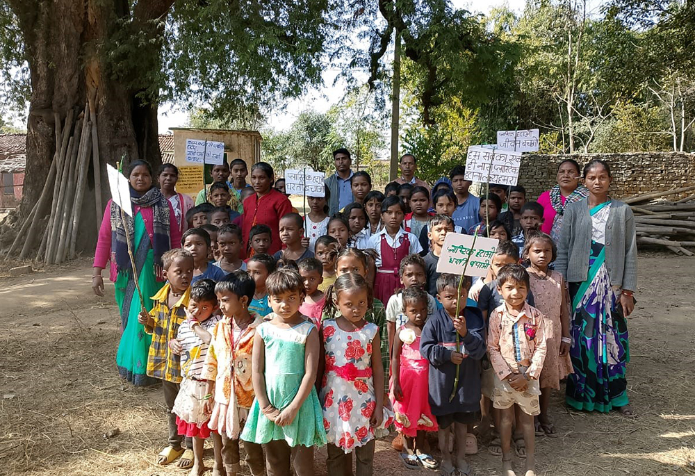 Children from a children's parliament in Tirra, Jharkhand, India, participate in community leadership and development activities. The photo was taken by the project coordinator. (Courtesy of Deepa Moonjely)