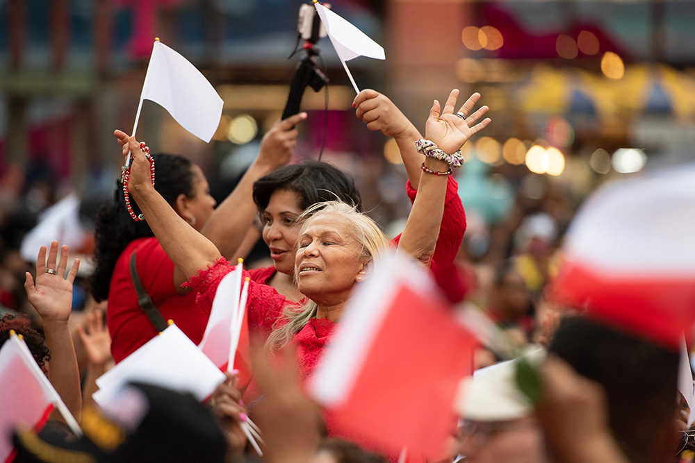 A woman prays during a eucharistic procession through the Manhattan borough of New York City to St. Patrick's Cathedral for a Pentecost Vigil May 27, 2023. (OSV News/Jeffrey Bruno)