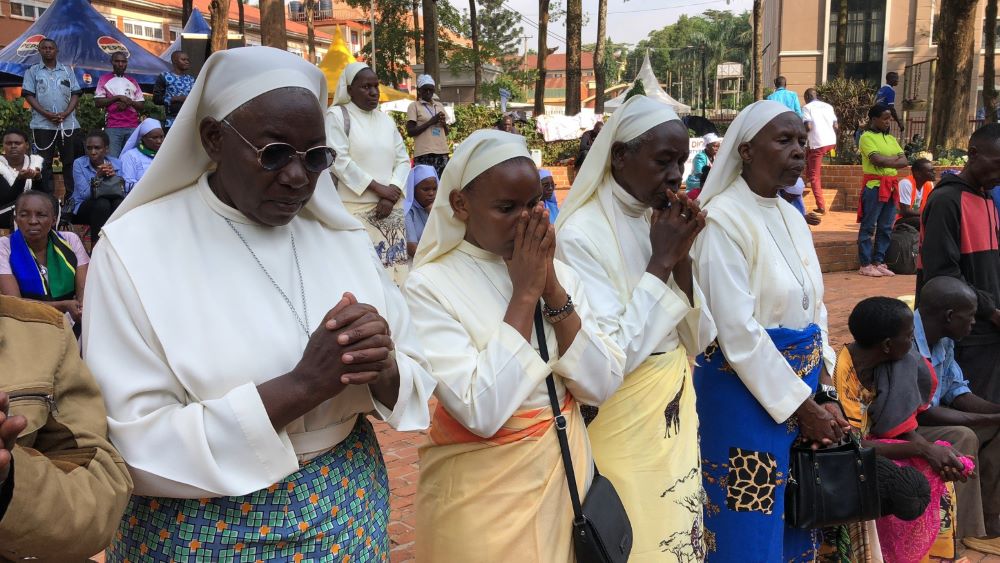 Catholic sisters pray at the Uganda Martyrs Shrine at Namugongo in Kampala, Uganda's capital. The site honors 22 Catholics killed in the 19th century for refusing to denounce their faith. (GSR photo/Gerald Matembu) Catholic sisters pray at the Uganda Martyrs Shrine at Namugongo in Kampala, Uganda's capital. The site honors 22 Catholics killed in the 19th century for refusing to denounce their faith. (GSR photo/Gerald Matembu)