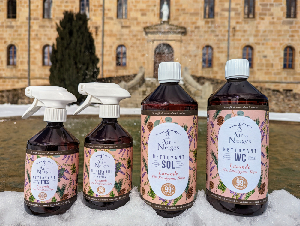 Air des Neiges cleaning products. Air des Neiges, 99,9% natural cleaning products. In this photo are featured products in the scent of lavender with touches of pine, eucalyptus, and thyme. From left to right, a window cleaner, a multi-surface cleaner, a floor and a bathroom cleaner (Courtesy of Abbaye Notre-Dame des Neiges)